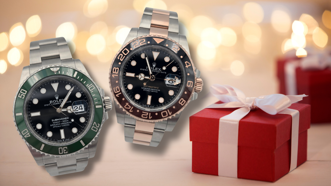 Luxury watches next to red gift box