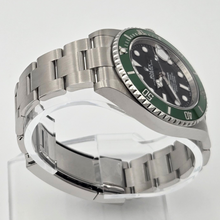 Left side view of Rolex Submariner Date 41 mm (Ref. 126610LV) - 2026 - Green Bezel “Starbucks” on watch holder