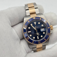 Rolex Submariner Date "Bluesy" 116613LB in gloved hand