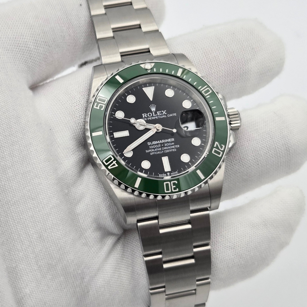 Rolex Submariner Date 41 mm (Ref. 126610LV) - 2026 - Green Bezel “Starbucks” in white gloved hand