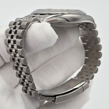 Rolex Datejust 41 (126300) - Green Dial & Jubilee Bracelet smooth case details in gloved hand