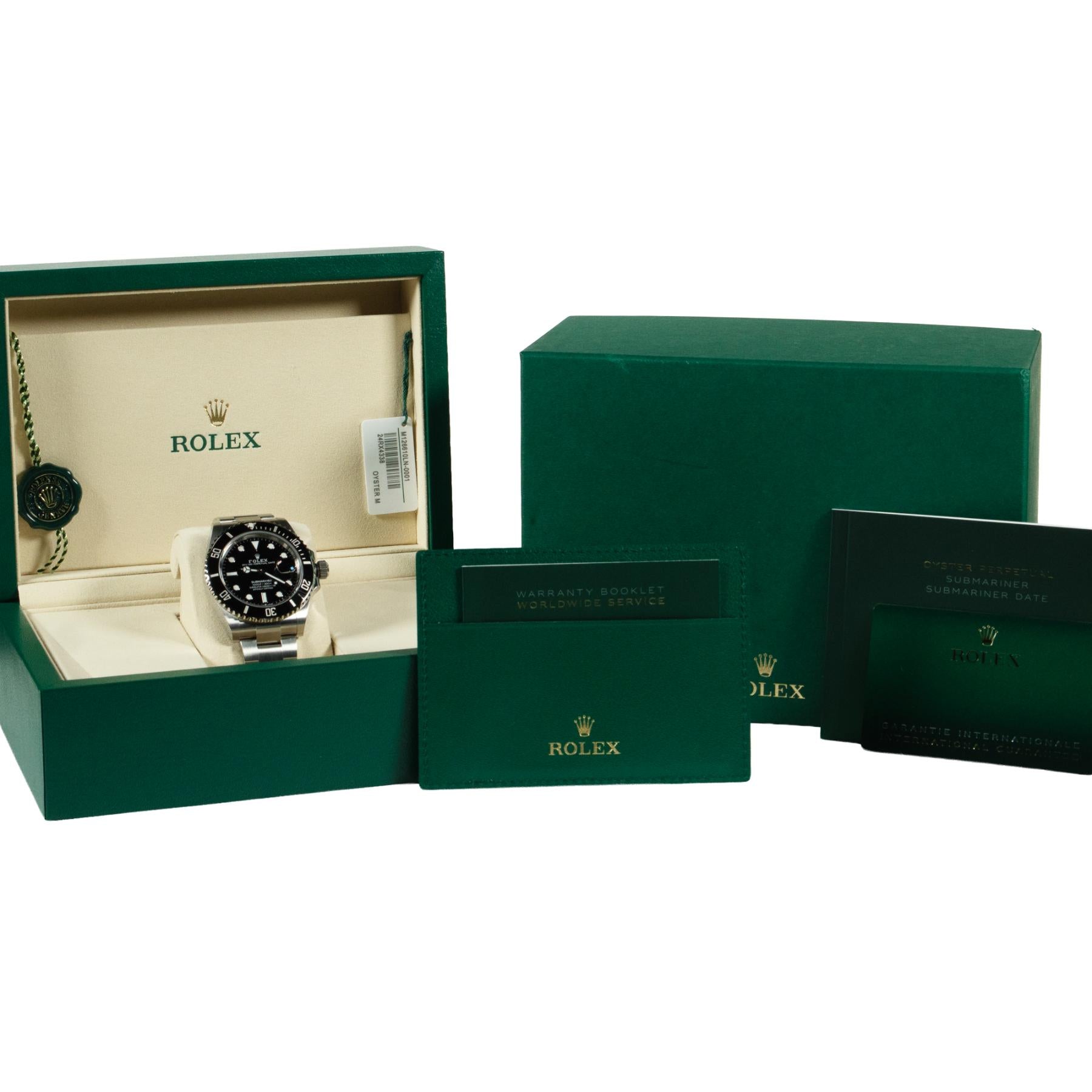 Rolex Submariner Date 126610LN box and papers with white background