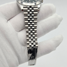 Side details of Rolex Datejust 41 (126300) - Green Dial & Jubilee Bracelet