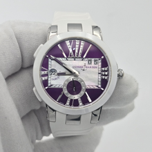 Ulysse Nardin Executive Dual Time Lady with purple dial and white band being held by hand with white glove