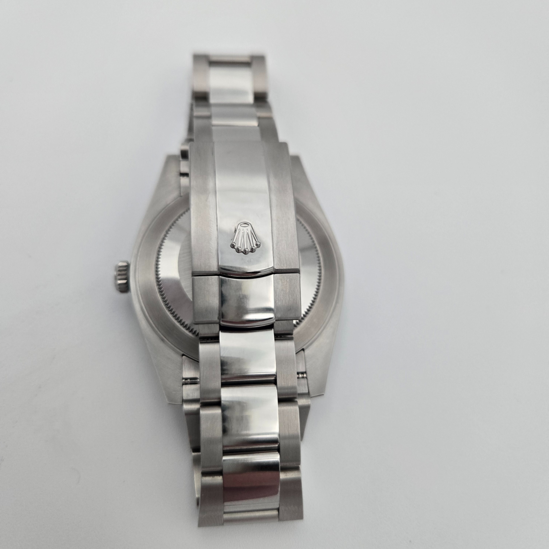 Rolex Oyster Perpetual Datejust 41 126300 back with Rolex logo on white background