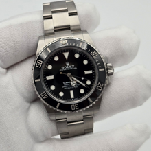 Rolex Submariner No Date 124060 41mm 2021 black dial in gloved hand