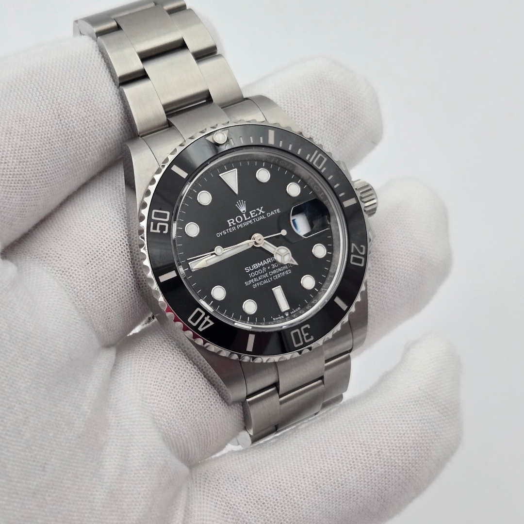 Rolex Submariner Date 126610LN Black Dial 41mm in gloved hand