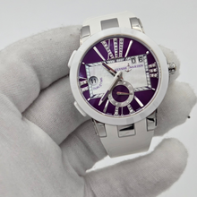 Ulysse Nardin Executive Dual Time Lady with purple dial being held by white gloved hand.