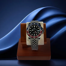 Rolex watch on a wooden stand with a blue fabric background