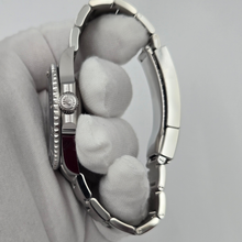 Rolex Submariner 124060 details of crown on dial
