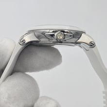 Side view details of UN dial on case of Ulysse Nardin Executive Dual Time Lady