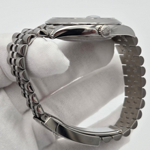 Rolex Datejust 41 (126300) - Green Dial & Jubilee Bracelet dial details in gloved hand